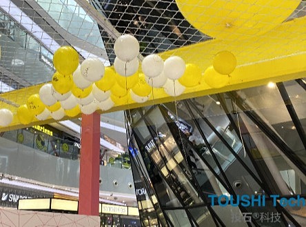 投石案例：北京来福士购物中心12周年庆典气球机械写字装置
